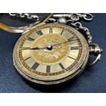 18k Swiss fob watch, 36mm case, engraved gilt dial, roman numerals, gold plated dust cover, gold