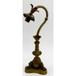 Art Nouveau gilt brass table lamp, with fluted arched stem on paw feet and triform base, 39cm high