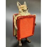 Rare good quality Bergman bronze study of a standing fox holding a leather framed A-board, unmarked,