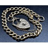 9ct curb link bracelet with heart padlock clasp, the chain 29cm long approx, 16.9g