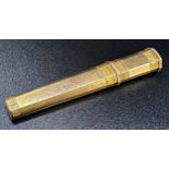 Unmarked high carat gold toothpick or needle case with engine turned boarders, 6.5cm long, 6.5g