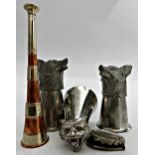 Mixed hunting and sporting lot comprising two pewter fox mask stirrup cups, wild cat stirrup cup,