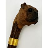 Good quality well carved Brigg pug head walking stick with glass eyes, 92cm long