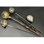 Four antique horn handled silver toddy ladles