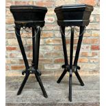 A pair of 19th century ebonised hexagonal jardiniere stands, the wavy aprons with brass studded