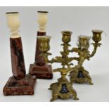 Pair of French cast ormolu twin branch candlesticks the bases with inset floral enamel panels,