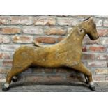 Good Folk Art carved pine study of a galloping horse, traces of original paint, 68cm high x 93cm