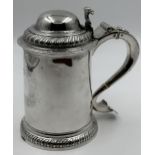 A George III provincial silver lidded tankard, John Langlands I, Newcastle 1772, gadroon detail to