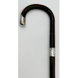 A Victorian silver collared and topped bamboo walking stick, C & Co?, Birmingham 1849, of tapering