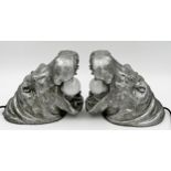 Pair of novelty wall lights in the form of silvered hippo masks, 23cm deep with a further monkey