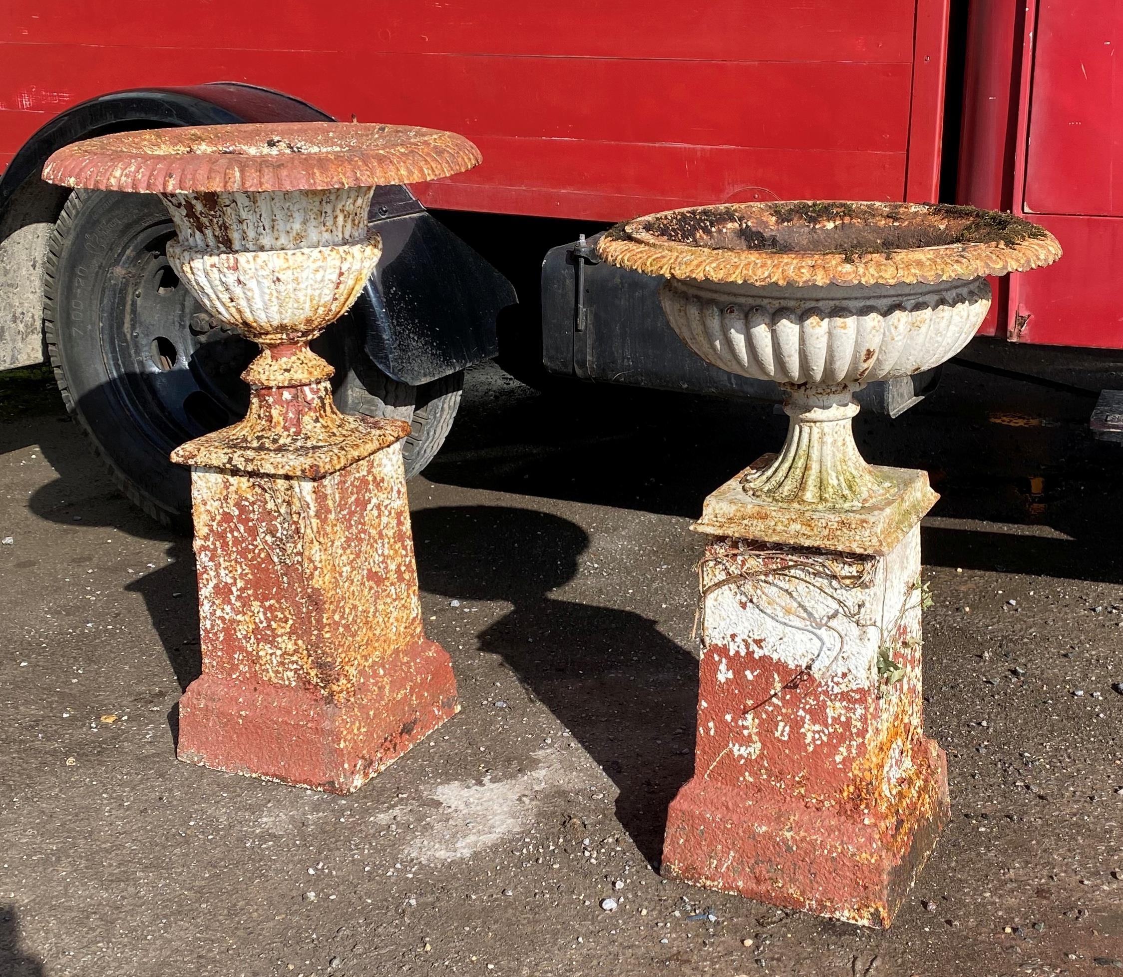 Matched pair of cast iron urns on associated columns, 86cm high approx - Image 2 of 5