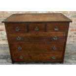 Good quality Arts and Crafts solid walnut chest of drawers, three short over three long drawers,