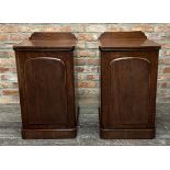 Pair of Victorian mahogany bedside cabinets, arch panelled doors enclosing a drawered interior, 85cm