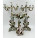 Dresden type porcelain table garniture, with centrepiece and pair of four branch candelabra, with