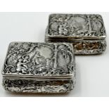 A near pair of continental silver table snuff boxes, one with import marks for London 1892/3, both