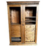 Good quality early 20th century pine cupboard, carved 'MIRABILE DICTU' to cornice, twin doors