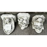 Three heavy plaster brackets, each cast with angels or cherubs, Height 44cm x Depth 35cm x Width