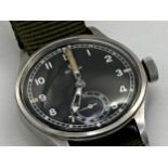 A Gent's Omega H.S.10 Royal Navy Dive Supervisor's wristwatch, c.1945, the black dial with 'T' mark,