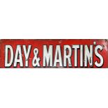 Advertising - 'Day & Martin's' enamel sign, white text on red, 27 x 124cm