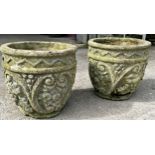 Pair of reconstituted stone urns with zigzag and scrolled decoration, Height 38cm x Diameter 41cm