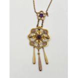 Good possibly 15ct (unmarked) amethyst drop pendant and chain, with pierced and filigree flower head