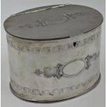 19th century silver plate oval tea caddy, with engraved Greek Key bands, 11.5cm high