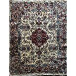 Large full pile country house Tabriz carpet, red a blue medallions on a cream ground, 350 x 245cm