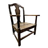 18th century Welsh oak Carmarthenshire broad seat carver chair, central vase splat, and old