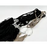 Three pairs of black rope twist curtain ties with prismatic glass weights and a further gold pair (