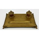 19th century gilt brass desk standish, two lidded inkwells and a pen tray, 34cm wide