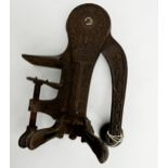 Good antique cast iron bar top bottle opener, decorated with floral trails inscribed 'Original