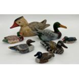 Seven carved and painted decoy ducks, the largest 27cm long