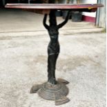 Good early 20th century cast iron tavern table, the base in the form of a dancer, Height 73cm x