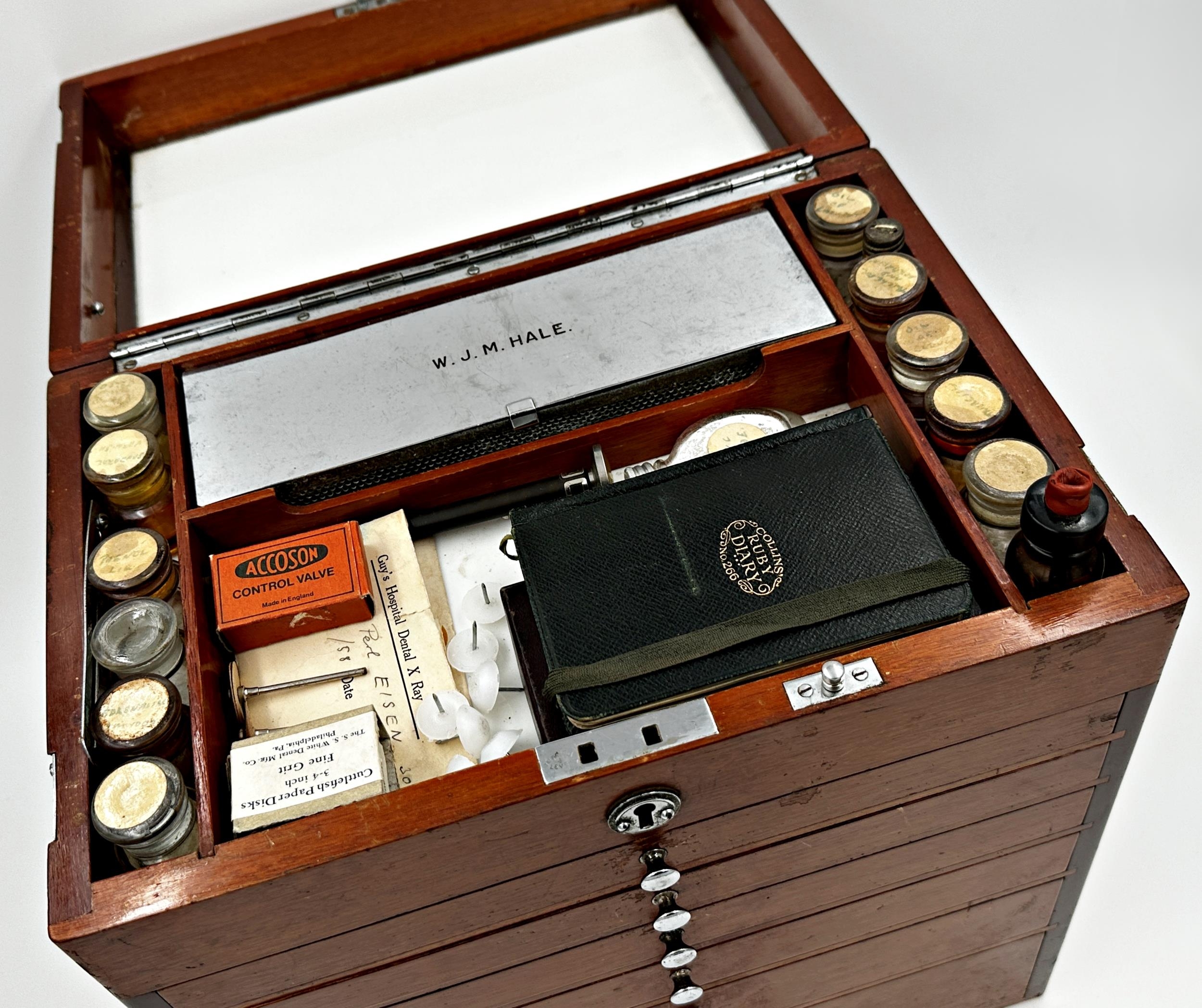 Vintage teak cased travelling dentist cabinet by The S S White Co of London, hinged lid with six - Image 2 of 2