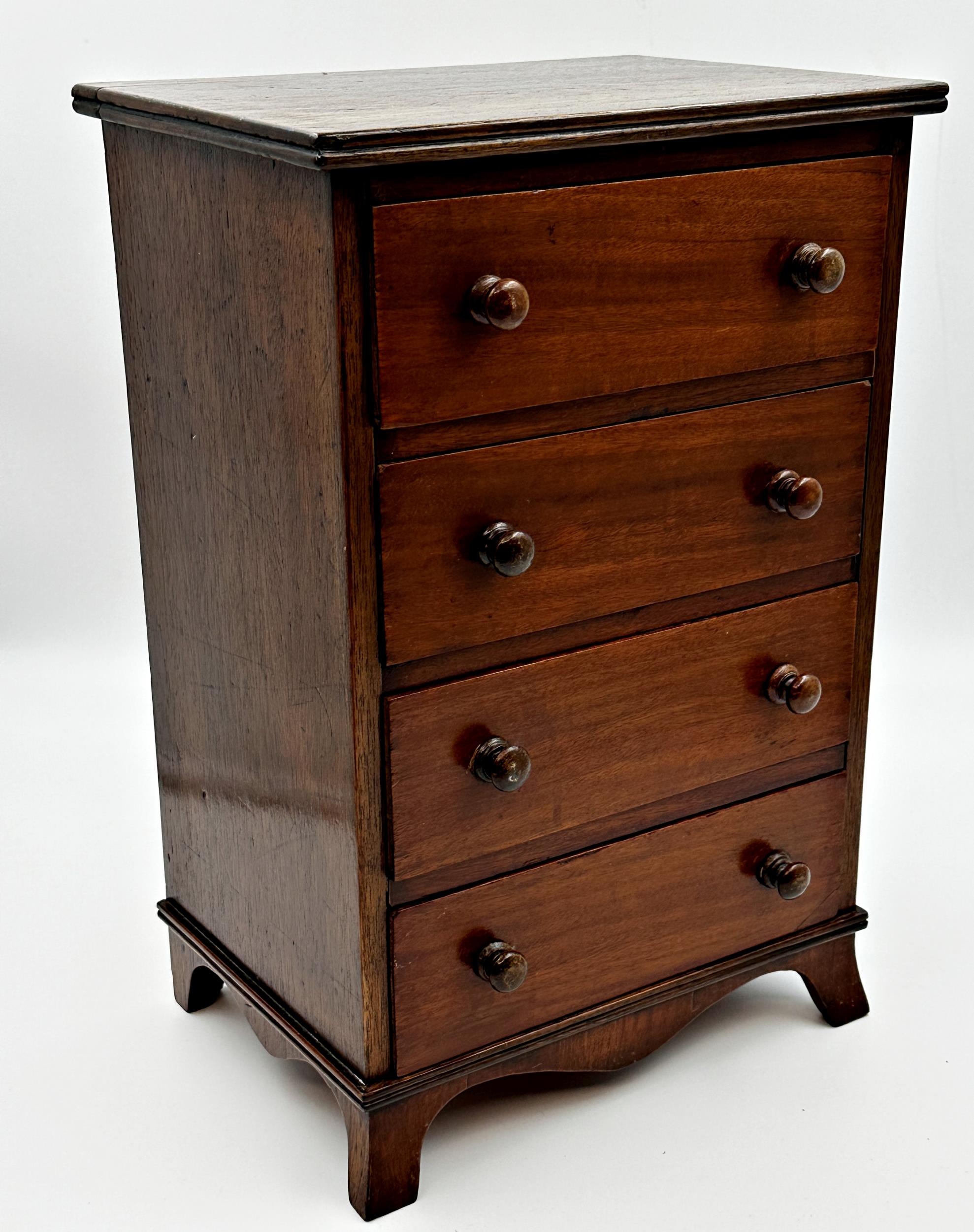 Late Victorian mahogany apprentice chest of four drawers, on splayed feet, 39cm high x 26cm wide
