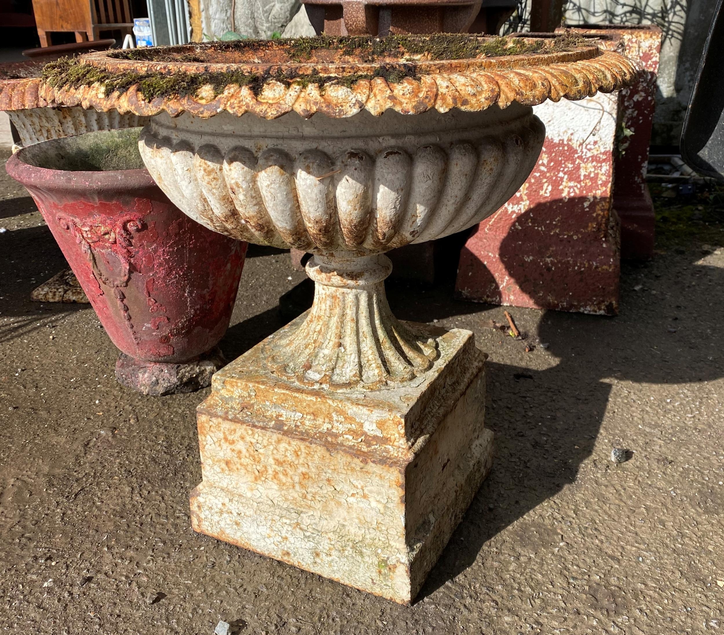 Matched pair of cast iron urns on associated columns, 86cm high approx - Image 5 of 5