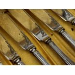 Pair of Victorian silver fiddle serving spoons, with five crested teaspoons, dessert fork,
