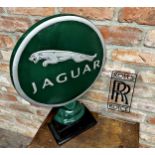 Reproduction cast metal Jaguar advertising sign, 50cm high with further Rolls Royce inscribed