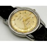 A Gent's Longines Conquest automatic wristwatch, c.1950s/60s, the dial with gilt baton markers and