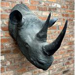 Good quality large fibreglass replica rhinoceros head wall mount, with glass eyes, 94cm deep