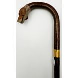 Probably by Swaine & Adeney - Crook handled walking stick with carved foxhound knop, glass eyes,