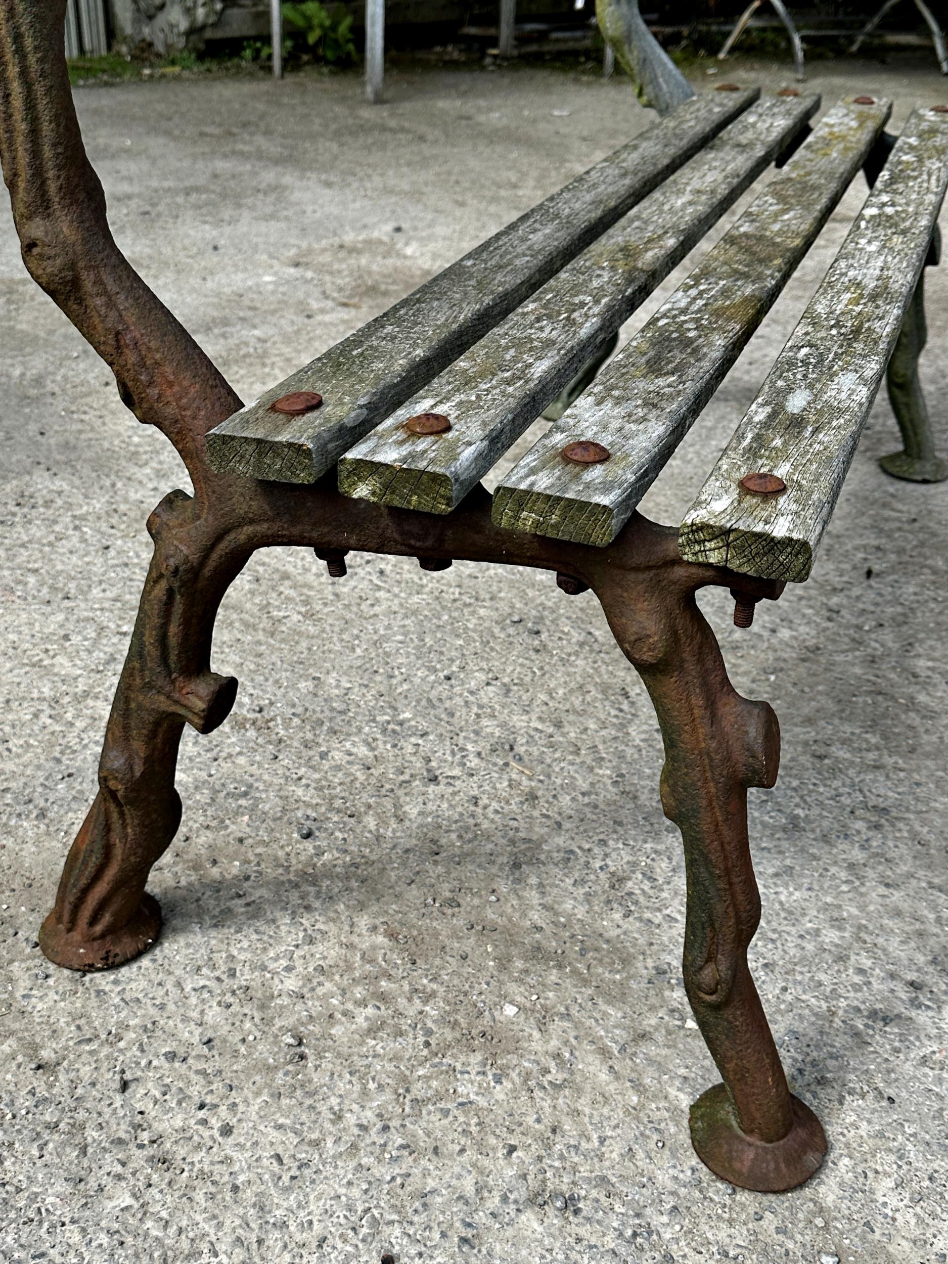 Antique cast iron framed teak bench, with naturalistic branch framework, 120cm long x 84cm high x - Image 2 of 2