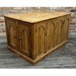 Unusual Gothic pine storage cupboard or coffee table, fitted with twin doors at the far ends, and