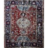 Old Mahal rug with typical Islamic scrolls on red ground, 180 x 145cm with a similar Tabriz rug (af)