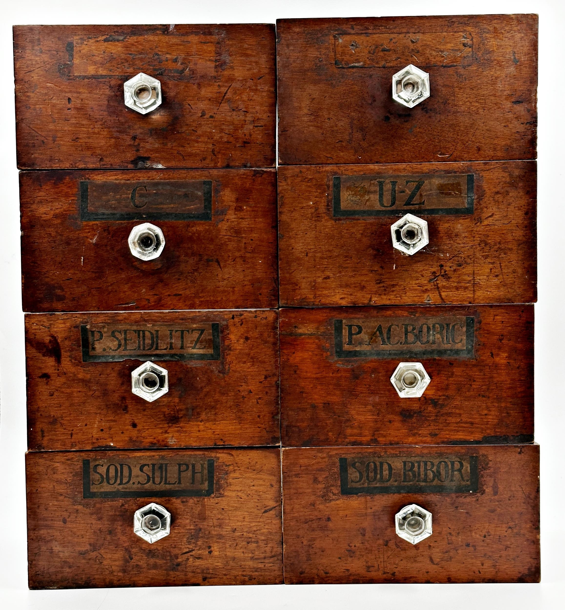 Set of eight 19th century apothecary drawers, with original labels and glass knobs, 13cm high x 25cm