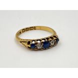 Late Victorian 18ct diamond and sapphire cluster ring, .2ct central stone, size N/O, 2.9g