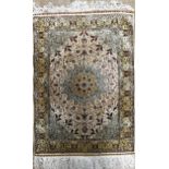 Incredible hand stitched Turkish Hereke silk rug from East Anatolia, with signature, scrolled floral