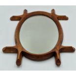 Arts and Crafts elm oval wall mirror, 59cm x 47cm.