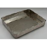 Silver Plated tray with stylised turreted rim, sat upon four ball feet. h7 x l36.3 x w29.5cm