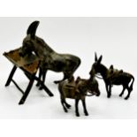 Austrian cold painted bronze study of a Donkey at trough, 7.5cm long, with a further pair of donkeys